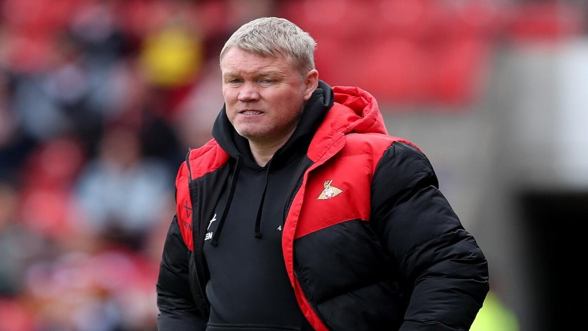 Doncaster Rovers boss Grant McCann watches on